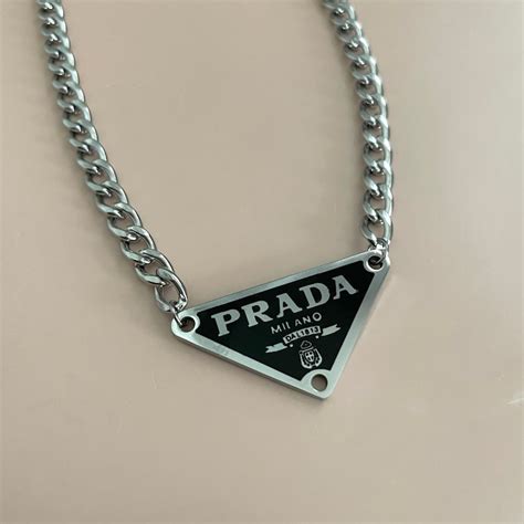 prada white triangle necklace|Prada necklace triangle black.